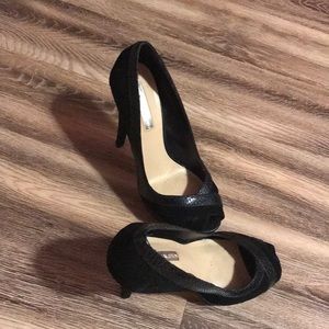 Black peep toe pumps